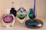 Large collection of art glass and crystal perfume bottles