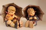 Hummel “Umbrella Boy” and “Umbrella Girl” figurines