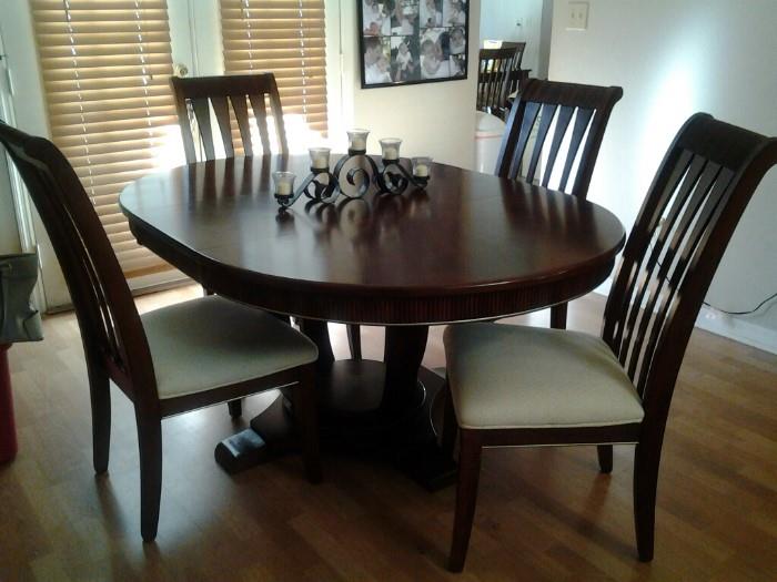Dining table, two leaves and 4 chairs
