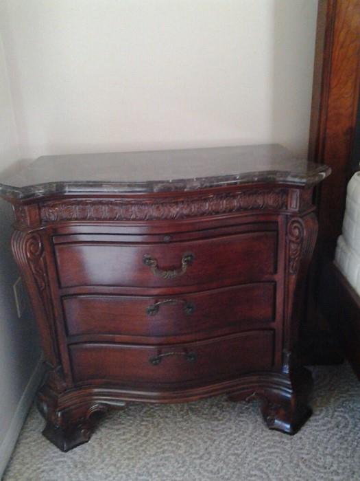 One of two nightstands