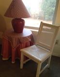 Wicker Chair, Custom Linens over 3-Legged Table, Lamp