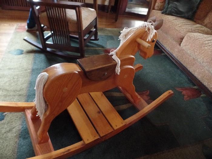 Hand made rocking horse. Rug and rocking chair not for sale