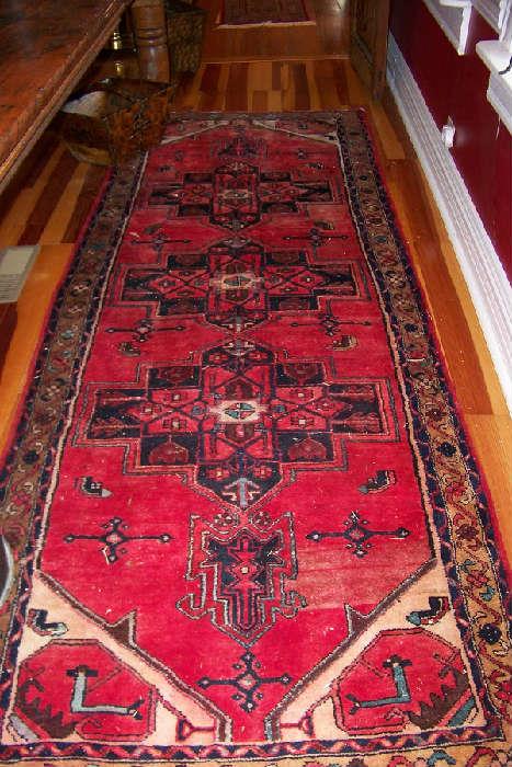 One of many antique rugs found in the home.  This runner is early 1900's in beautiful condition