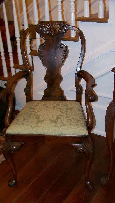 A George II stype arm chair.  The wood in this piece is beautiful - the chair is C. 1890-1910