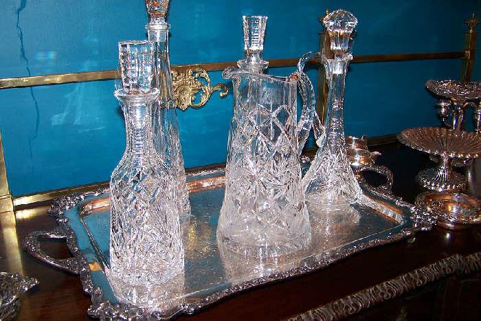 Beautiful early crystal decanters on a lovely large silverplate footed tray