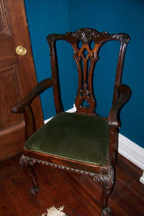 One of the arm chairs to the dining room chairs.  These chairs date to around 1900-1920 and are in beautiful condition.  There is a set of 6- 4 side chairs and two arm chairs