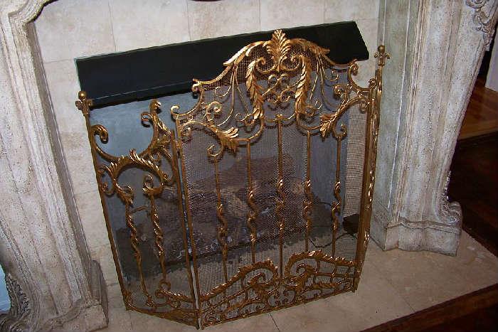 Brass firescreen - in the dining room