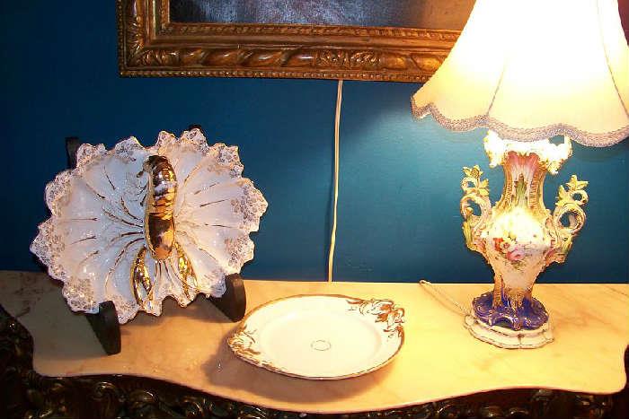 One of a pair of Old Paris lamps - a lobster bowl is shown on the stand