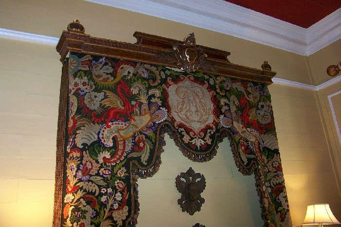 Needlepoint canopy over the bed - the piece came from an old monestary in Europe