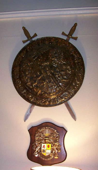 Solid brass shield with iron sword blades