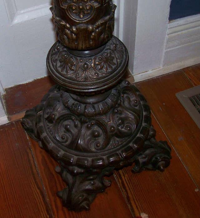 This is a beautiful pedestal made of iron!  It is absolutely stunning!