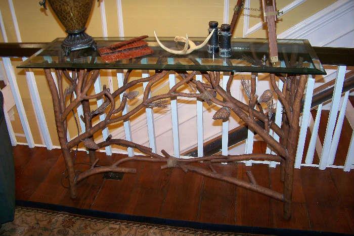 Unusual iron twig console with beveled glass top