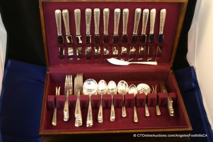 69 pieces of Towle Sterling Silver:  12 dinner knives; 10 butter spreaders; 10 salad.dessert forks; 10 dinner forks; 10 cream soup spoons; 10 teaspoons; 1 butter knife; 1 sugar spoon; 1 berry spoon; 1 bon bon server; 1 lemon fork; 2 pickle forks.