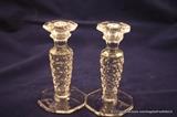 A vintage pair of Fostoria American pattern candlestick in excellent condition.