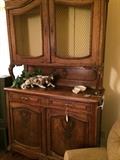          Antique breakfront with lower storage