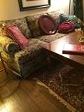     Another sofa, coffee table, & decorative pillows