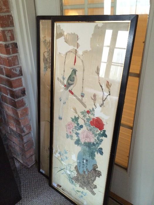            One of two framed Asian art pieces