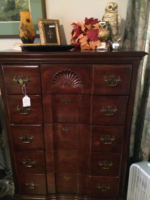 Like-new chest of drawers has matching bed, dresser, and nightstands.