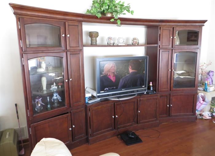 Curved entertainment center wall unit