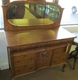 Oak Ladies Dresser 2 drawers over 4 drawers + bonnet cabinet w/mirror. 36" High X 60" High to top of mirror x 46" Wide X 21" Deep