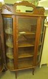 #23 Oak flat front curved side glass 4 wood shelves china cabinet with ornate back splash w/mirror.  59" High X 70" High to top of back splash X 38 1/2" Wide X 12 1/2" Deep
