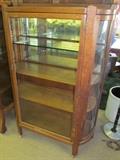 Oak flat front curved sides 1 glass shelf 2 wood shelves with mirrored back for 2 top shelves with plexiglass on right side on casters 58" High X 60" to top of back splash X 40" Wide X 14 1/2" Deep