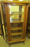 #22 Oak Bow Front China Cabinet with claw feet and 4 wood shelves w/mirror behind 2 top shelves 64 1/2" High X 38 1/2" Wide X 16 1/2" Deep