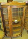 #16 Oak bow front china cabinet 1 glass shelf 3 wood shelves 62 1/2" High X 68" High to top of splash board 41" Wide X 16" Deep