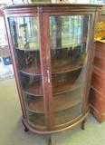 #21 Dark Oak Bow front china cabinet 4 wood shelves top one being mirrored 61 1/2" High X 39 1/2" Wide X 17 1/2" Deep