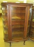#3 Oak flat front curved glass sides china cabinet 4 wood shelves 4 claw feet w/feathers on legs on casters 68 1/2" High X 48" Wide X 16" Deep