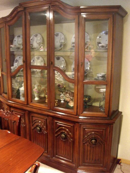 Wood china cabinet with glass doors