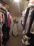Lots of 1980's style clothing and golf clubs
