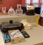 Fondue Pot, Cake Decorator, Cork Screw.