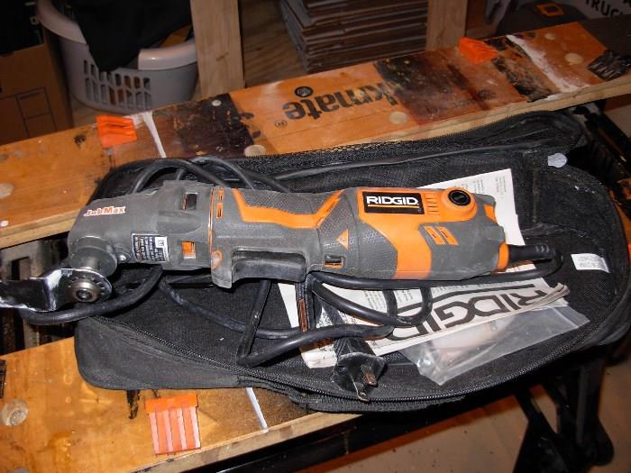 Ridgid oscillating tool with case and attachments