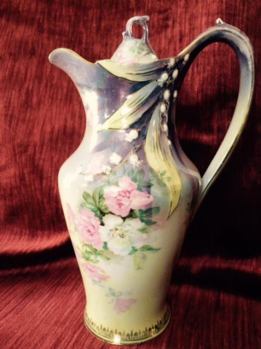 RS Prussia, 9.5" tall, Iridescent purple with lily of the valley and floral design
