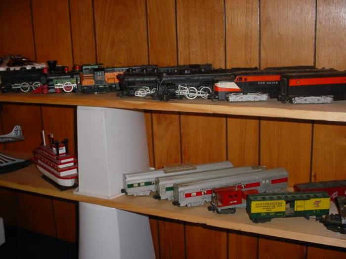 Large collection of 1950's American Flyer trains, as well as other manufactures and boxes of buildings, accessories, supplies, track,. etc.