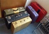 Vintage suitcases - note lavender vinyl one!