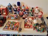 Christmas decorations: Japanese origami ornaments, wooden nutcrackers (some vintage German ones), cute Santa mugs, jingle bell wreath & other misc. ornaments