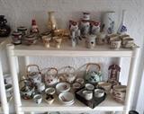 Japanese vases, teapots & light-up mirrored "altar" with geisha gazing at her own reflection (lower shelf - back right corner)