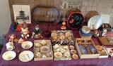 Clockwise from lower left: Beatrix Potter dishes by Royal Albert & Wedgwood + silverplate fork & spoon, hakata dolls, B & W photo of Japanese temple, antique gilt frame with curved glass, lacquer tray with flower, studio pottery plate by Yoji Kan, Japanese bowl w/ wood box, painted wood dollhouse table & chairs, vintage set of child's Blue Willow dishes in orig. wood display box, 3 lusterware kids tea sets