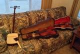 Japanese shamisen (stringed instrument)+ John Juzek (Prague) & Conrad Gotz (W. Germany) violins with cases + 1 bow - they're sitting on Thomasville 7 ft. tapestry sofa (88" long)