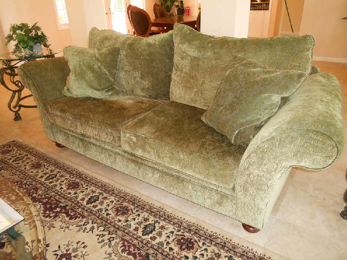 $350 each (there are two matching green sofas)
