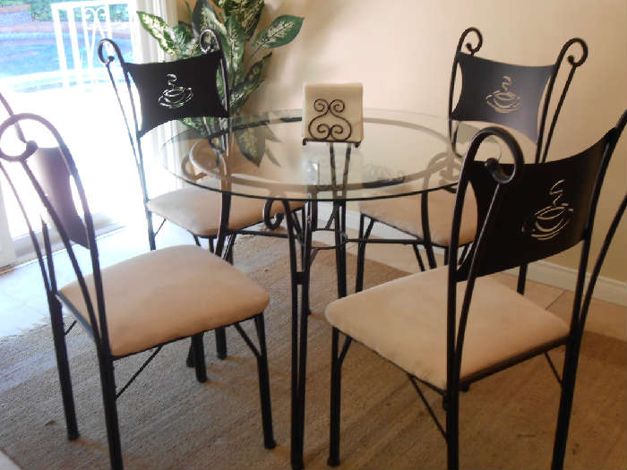 Iron and glass table and chairs set $125