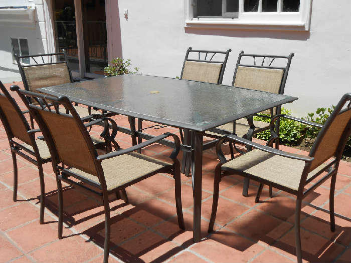 $195 for the table and 6 chairs (note there are two of these sets, there is also another table and chairs set, they are all priced at $195)