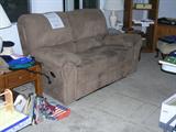 Dual Recliner Loveseat upholstered in tan ultrasuede.