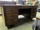 Solid wood base and drawers Deco style desk. Laminate top, nice hardware.