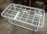 Indoor/Outdoor Glass top coffee table with white metal base