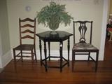Antique octagonal black table with side chairs