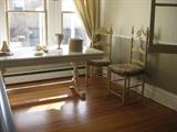 Fabulous dining table, cream colored and antique ladder back chairs (4) with custom French toille  cushions