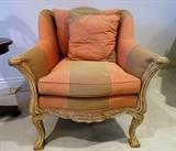Carved, upholstered chair